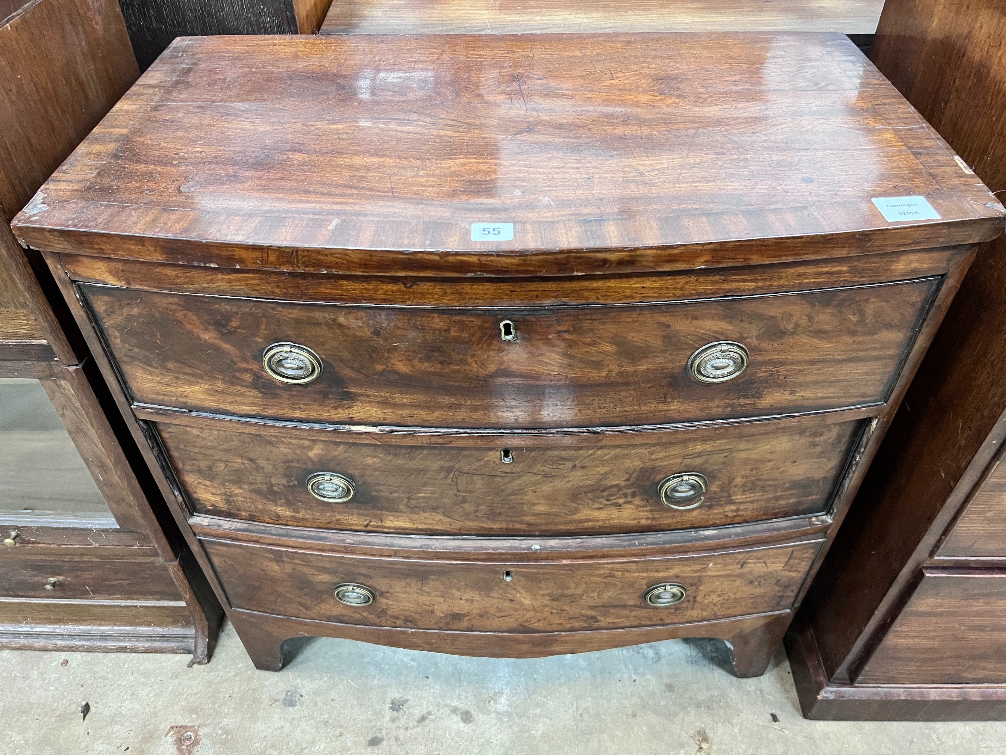 A small Regency banded mahogany three drawer bowfront chest, width 77cm, depth 43cm, height 77cm *Please note the sale commences at 9am.